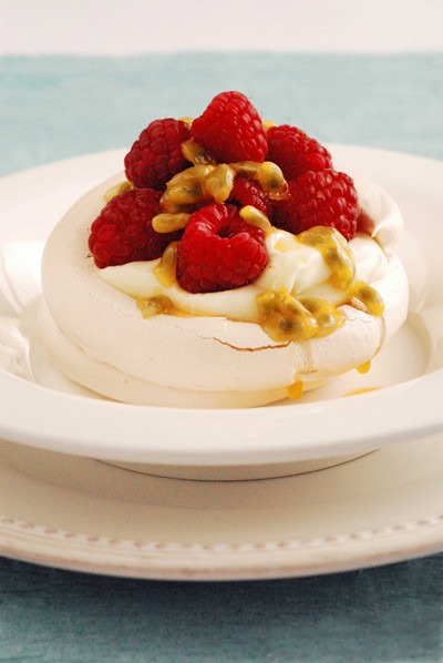 Piped Rasberry & Passionfruit Pavlovas